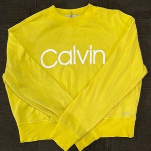 Bright yellow woman’s cropped Calvin Klein sweatshirt size XL
